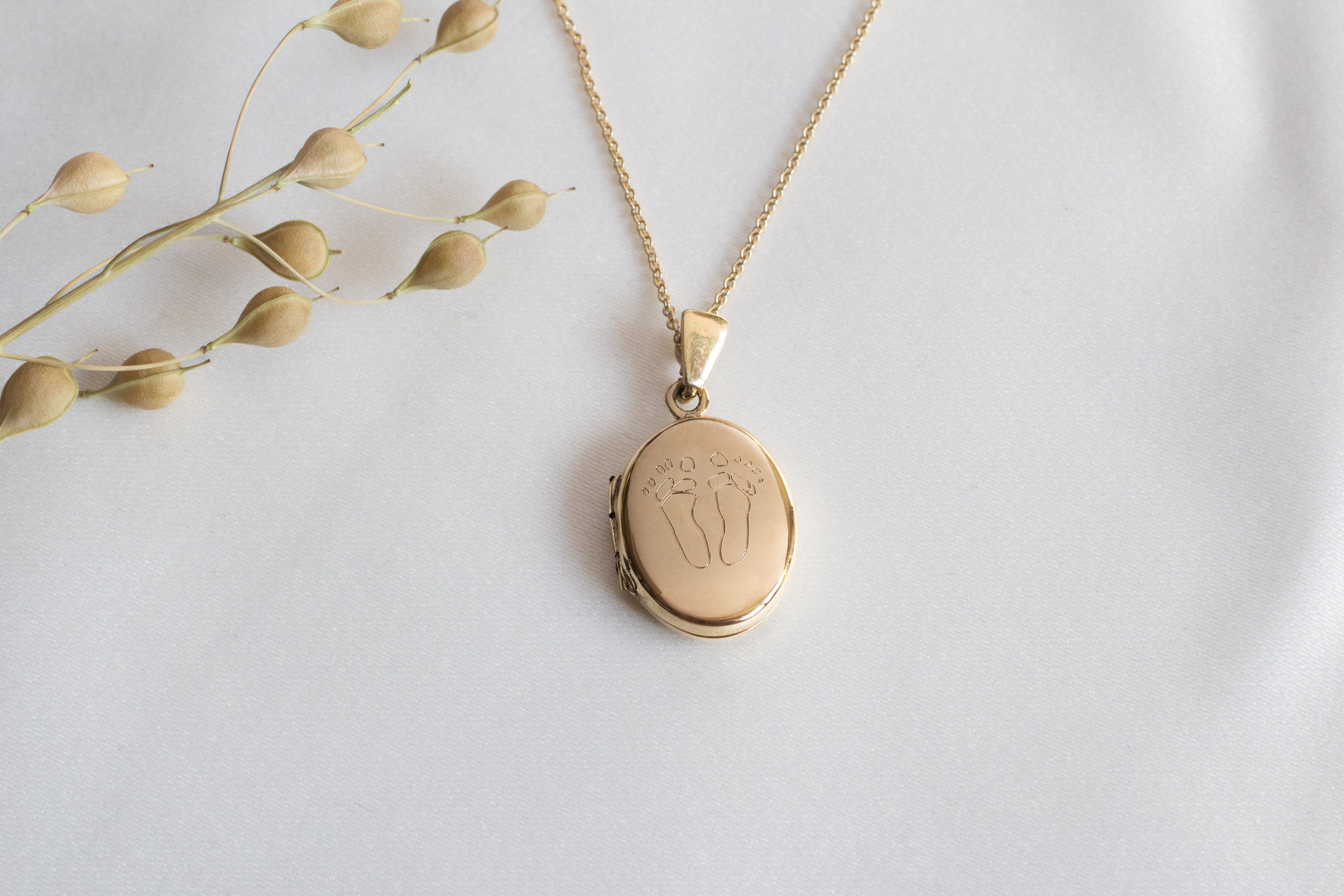 first mothers day jewellery gifts for new mums baby feet engraved locket