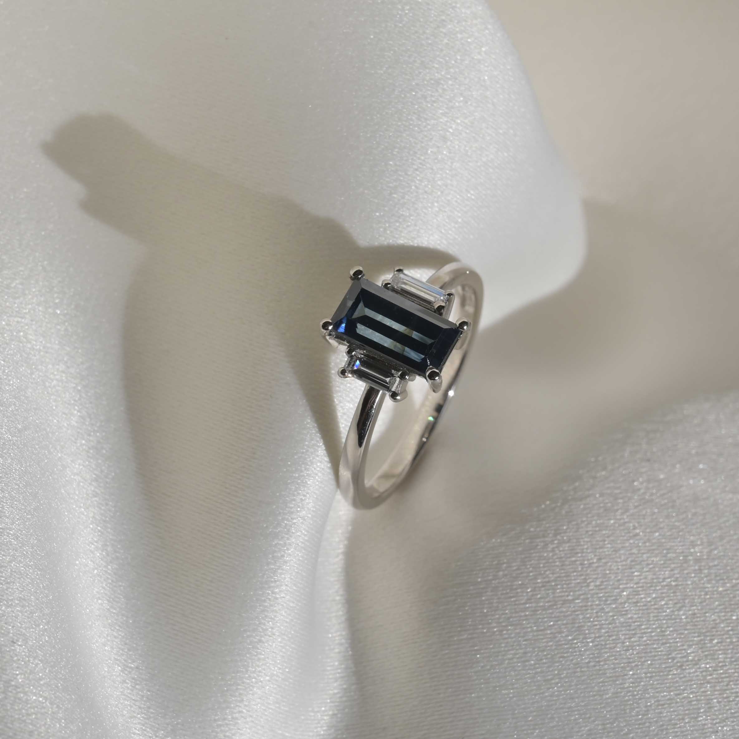 18ct White Gold Blue Sapphire Baguette Three Stone Engagement Ring