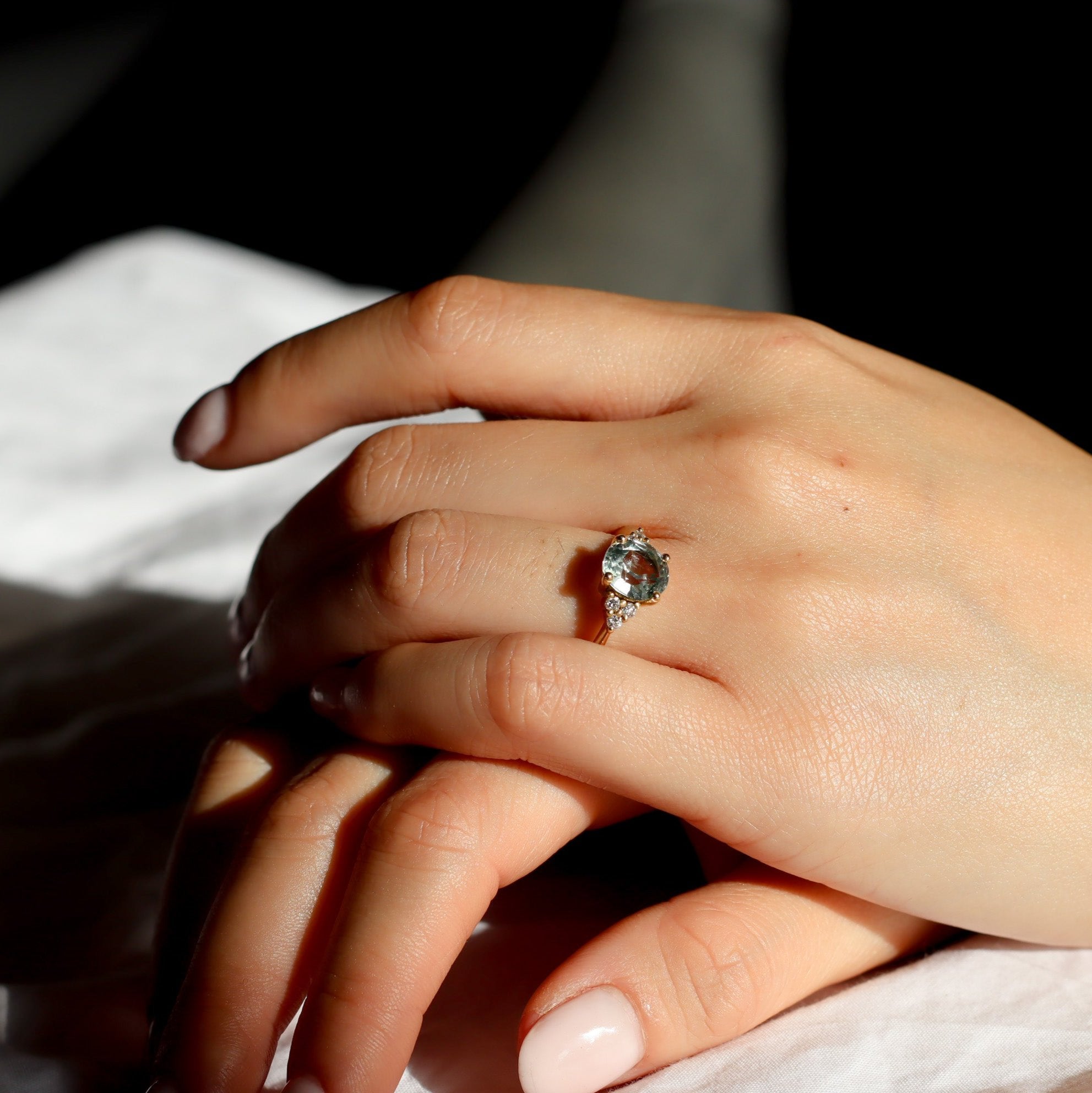 Light Blue Sapphire Engagement Ring With Cluster Diamonds