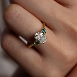 Oval Diamond and Green Tourmaline Trilogy Engagement Ring